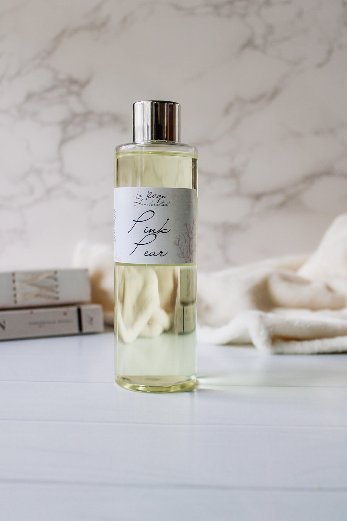 Pink Pear Room Diffuser Refill. Refill also comes with 8 black fiber reeds.
