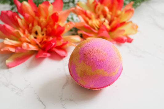 Peach Tea Bath Bomb, orange and pink with gold mica shimmer on top